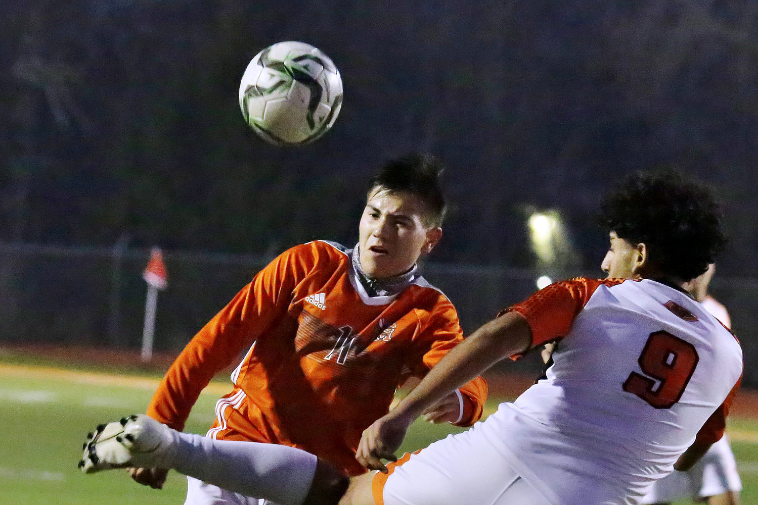 Mineola’s Fernando Rodriguez competes for a centering pass in Friday’s win against Gladewater.